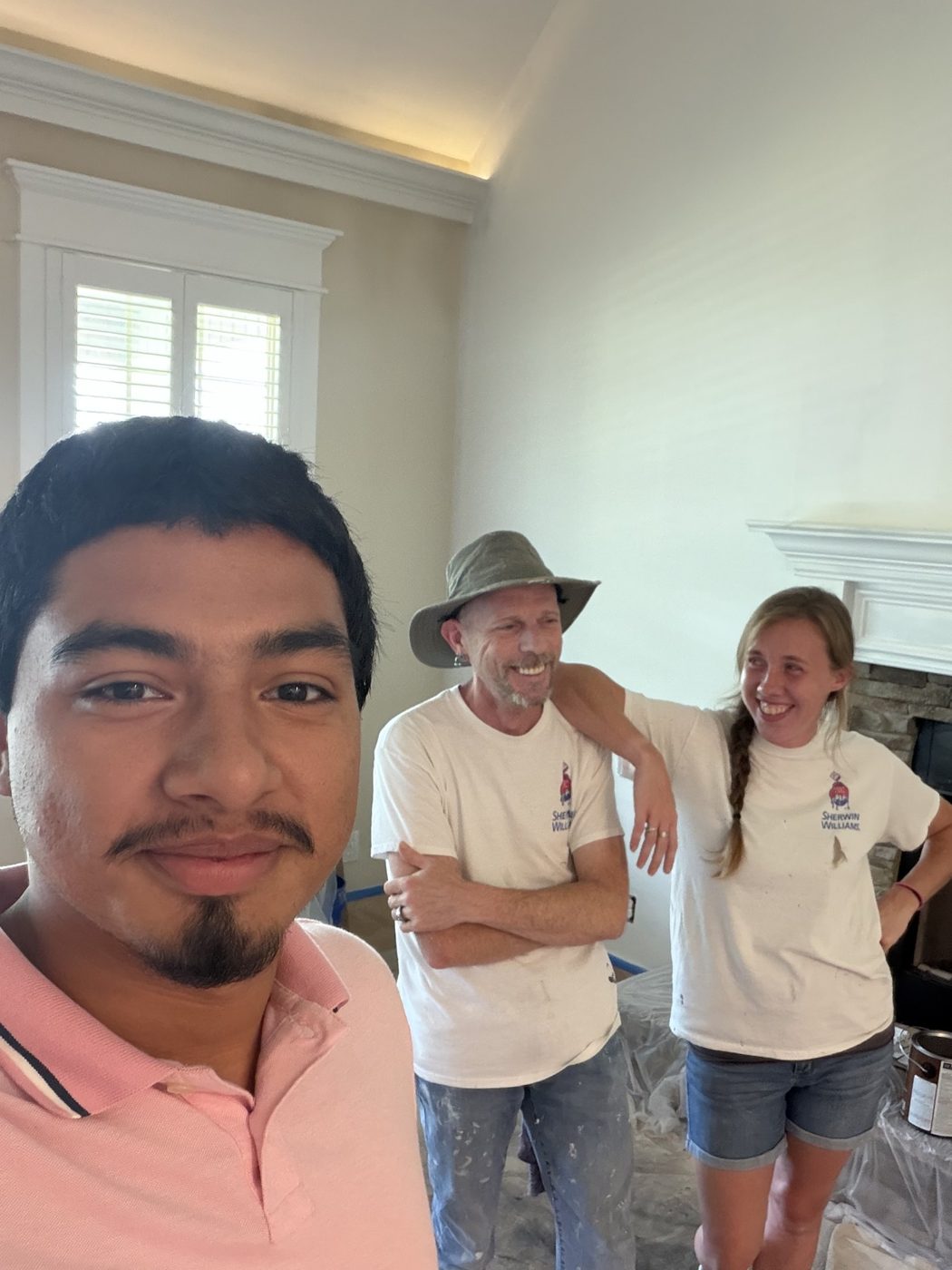 Avie and the Camellia Painting Pros crew on a job in Huntsville, AL